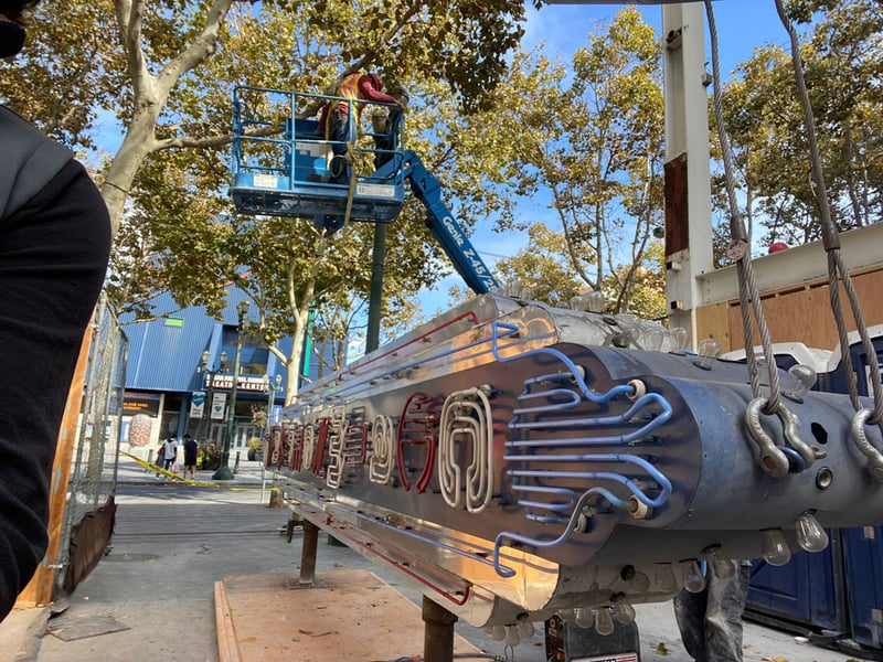 movie theater signage being removed