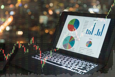 laptop with charts and graphs